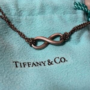 Tiffany & Co. Sterling Silver Infinity Pendant with Blue Pouch